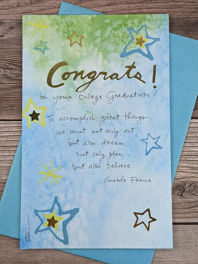 A blue congratulations card for a college graduate, featuring a pattern of stars and an inspiring message.