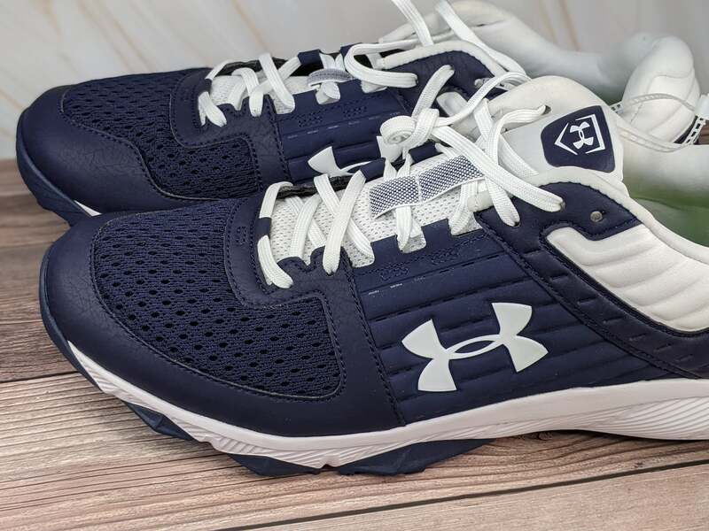 Under Armour Men's navy blue tennis shoes with white laces.